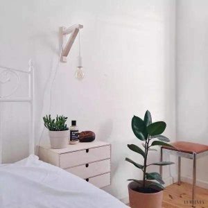 Nowoczesna lampa ścienna Fix z drewna w stylu skandynawskim