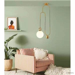 Nowoczesna lampa wisząca w kształcie koła mosiężna i szklana