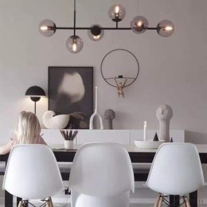 Lampa wisząca Orb w stylu industrialnym z kulistymi kloszami