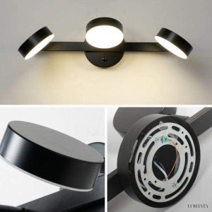 Nowoczesna lampa ścienna z regulowanymi okrągłymi kloszami