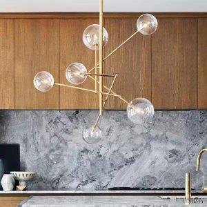 Nowoczesny żyrandol VERTICAL Ball w złotym stylu