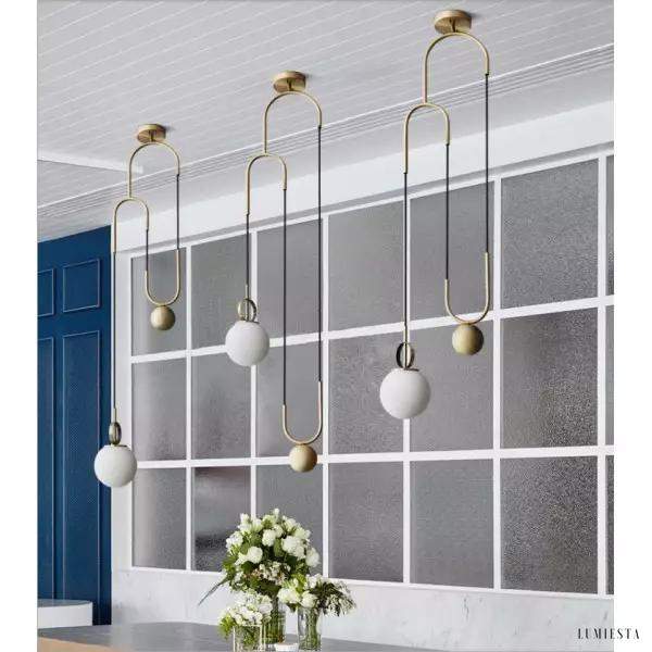 Nowoczesna lampa wisząca w kształcie koła mosiężna i szklana