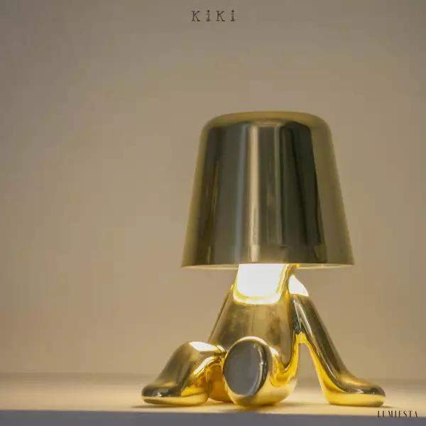 Innowacyjna lampa Thinker w kształcie postaci złotej lub chromowanej