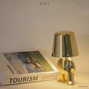 Innowacyjna lampa Thinker w kształcie postaci złotej lub chromowanej