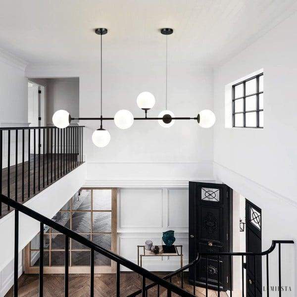 Lampa wisząca Orb w stylu industrialnym z kulistymi kloszami