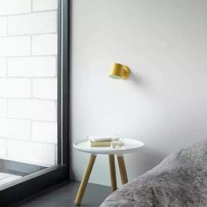 Lampka ścienna Normann Copenhagen Rise w minimalistycznym stylu