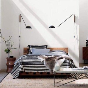 Lampa ścienna Swing Dome w nowoczesnym stylu minimalistycznym