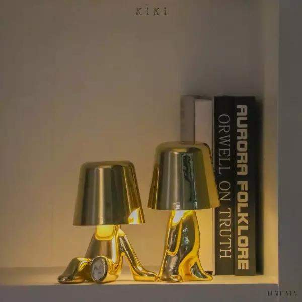 Innowacyjna lampa Thinker w kształcie postaci złotej lub chromowanej