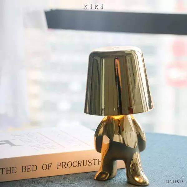 Innowacyjna lampa Thinker w kształcie postaci złotej lub chromowanej