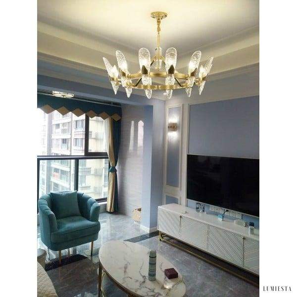 Nowoczesny żyrandol kryształowy w kształcie fali mosiężny