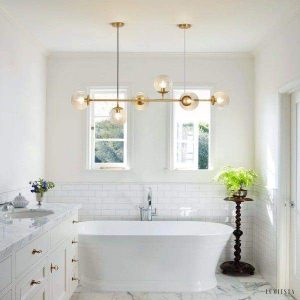 Lampa wisząca Orb w stylu industrialnym z kulistymi kloszami