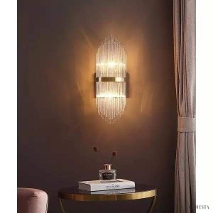 Kryształowa lampa ścienna w stylu art deco z mosiężnymi detalami