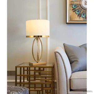 Metalowa lampa stołowa w stylu nowoczesnym z białym abażurem