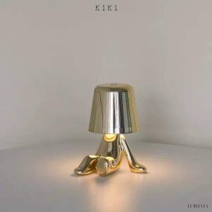 Innowacyjna lampa Thinker w kształcie postaci złotej lub chromowanej