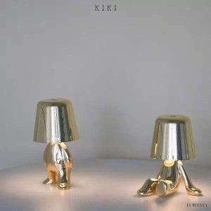 Innowacyjna lampa Thinker w kształcie postaci złotej lub chromowanej