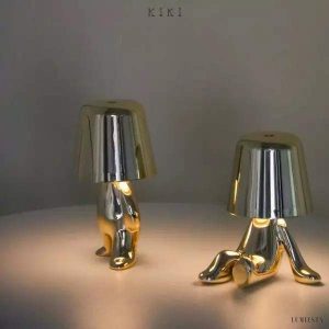 Innowacyjna lampa Thinker w kształcie postaci złotej lub chromowanej