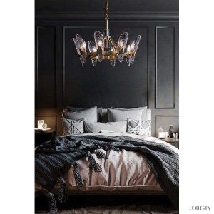 Nowoczesny żyrandol kryształowy w kształcie fali mosiężny