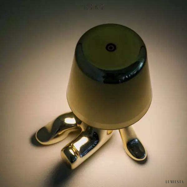 Innowacyjna lampa Thinker w kształcie postaci złotej lub chromowanej