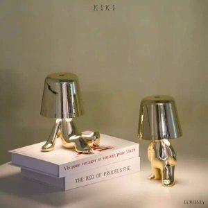 Innowacyjna lampa Thinker w kształcie postaci złotej lub chromowanej