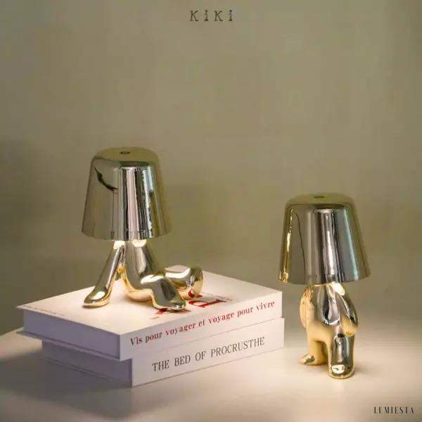 Innowacyjna lampa Thinker w kształcie postaci złotej lub chromowanej