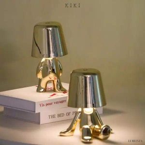 Innowacyjna lampa Thinker w kształcie postaci złotej lub chromowanej