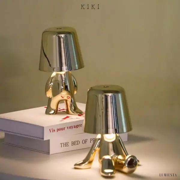 Innowacyjna lampa Thinker w kształcie postaci złotej lub chromowanej