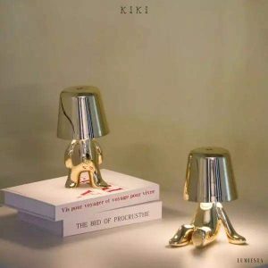 Innowacyjna lampa Thinker w kształcie postaci złotej lub chromowanej