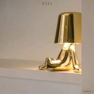 Innowacyjna lampa Thinker w kształcie postaci złotej lub chromowanej