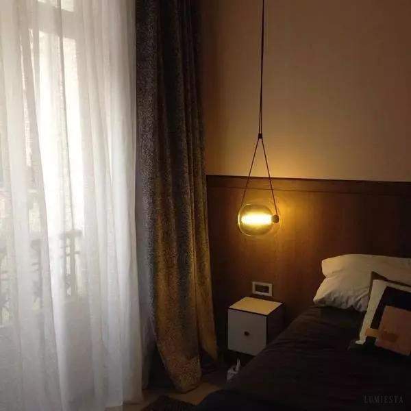 Lampa wisząca Api z szkła w kształcie komórki roślinnej