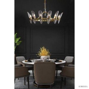 Nowoczesny żyrandol kryształowy w kształcie fali mosiężny