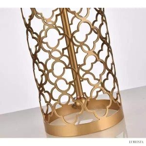 image_9-329.jpg Metalowa lampa stołowa wrażająca otwartą konstrukcją złotą