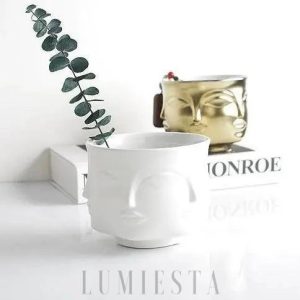 Ceramiczna doniczka w kształcie twarzy złoto-czarna