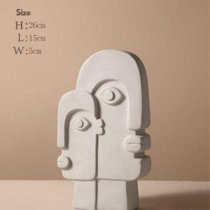 Wazon w kształcie twarzy z ceramicznym wykończeniem