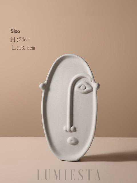 Wazon w kształcie twarzy z ceramicznym wykończeniem