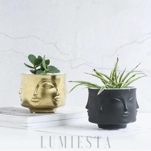 Ceramiczna doniczka w kształcie twarzy złoto-czarna