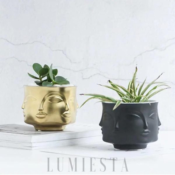 Ceramiczna doniczka w kształcie twarzy złoto-czarna