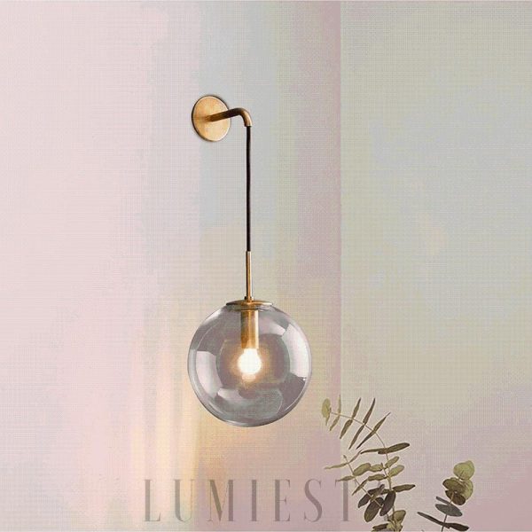 Elegancka wisząca lampa kula ze szkła i metalu