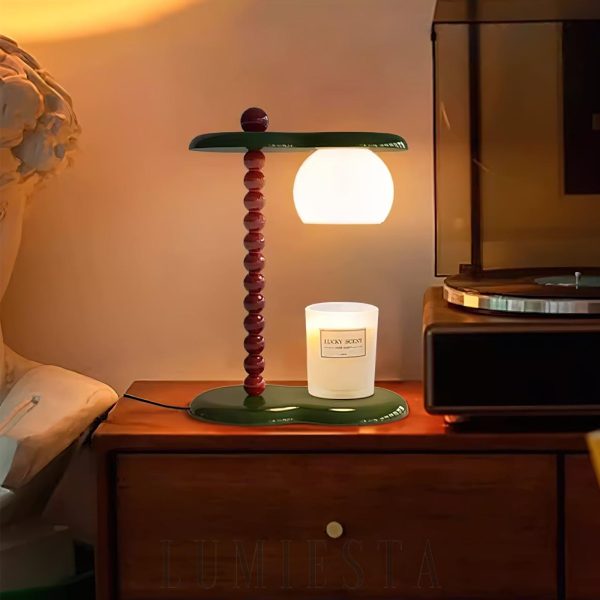 Nowoczesna lampa stołowa Everalda z podgrzewaczem świec